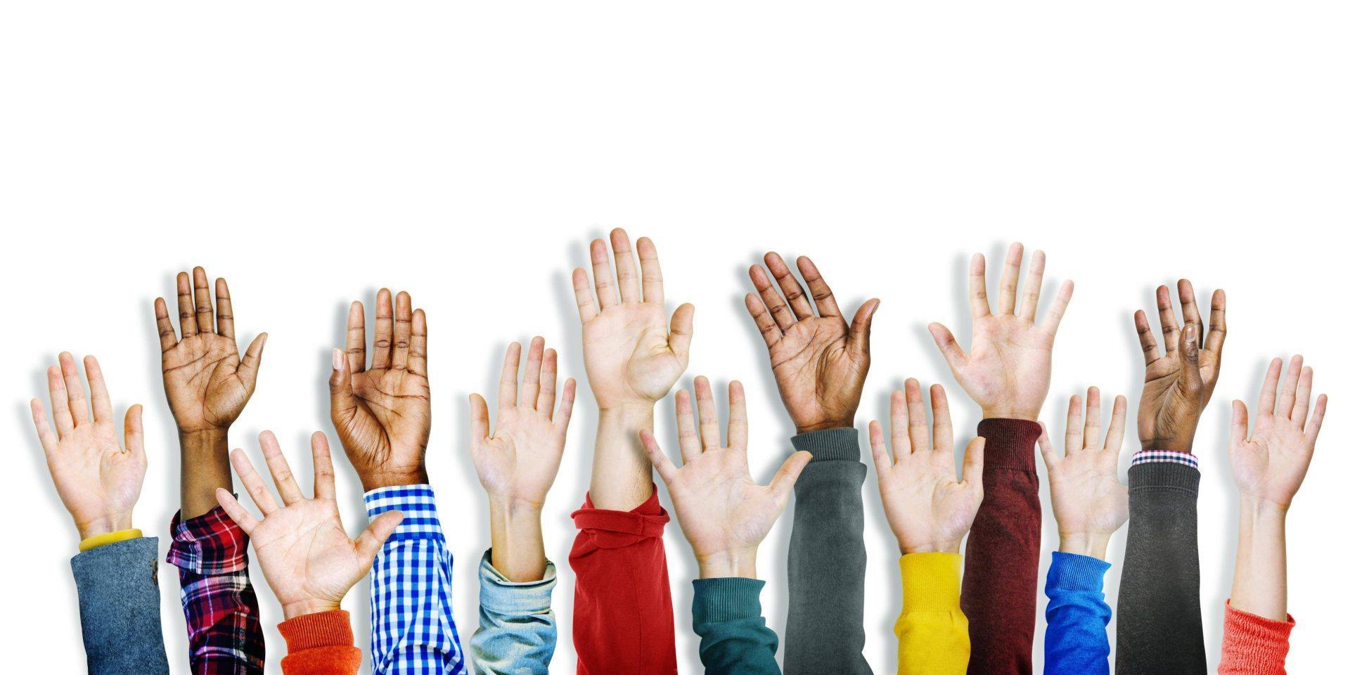 group of multiethnic diverse hands raised scaled